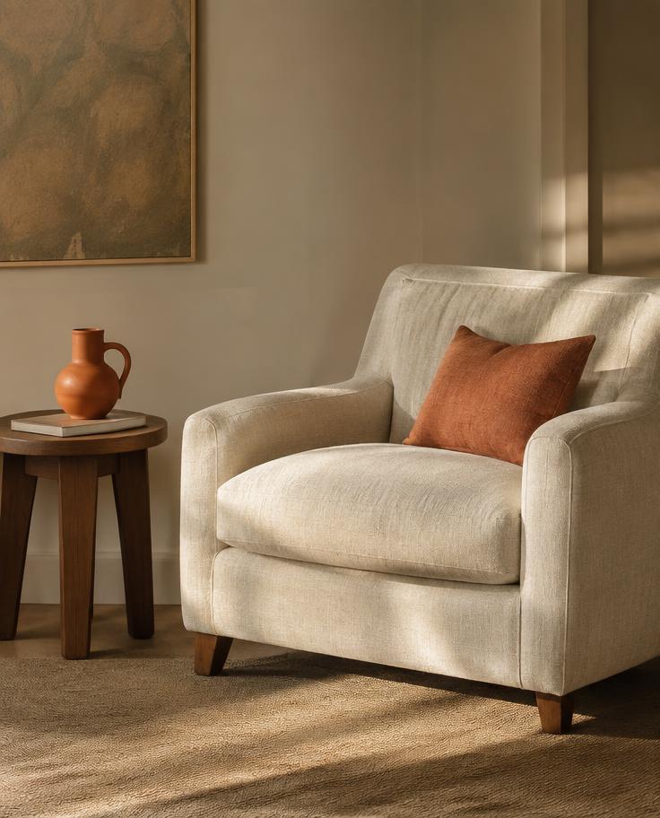 Linen armchair in soft afternoon light